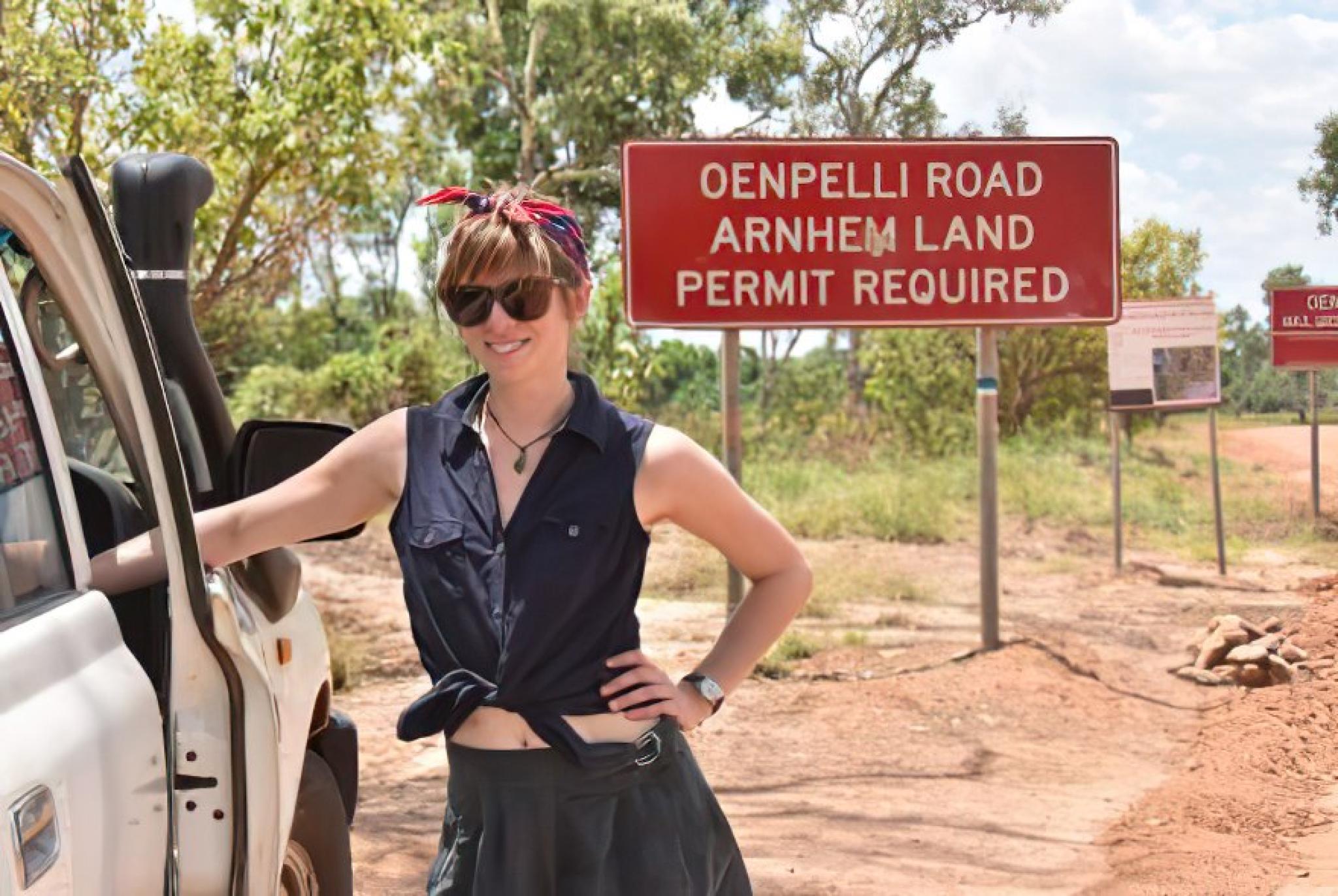 Alexandra Marley in front of Arnemland sign